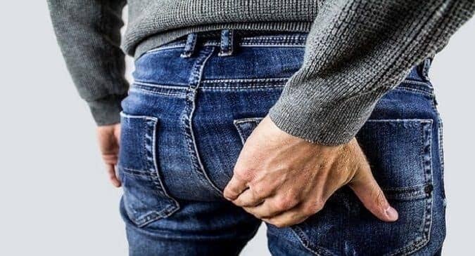 butt cramps period